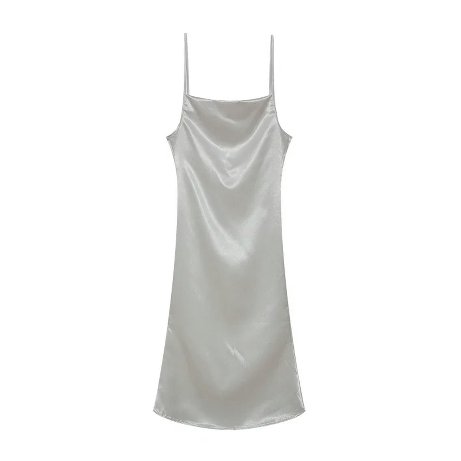 Robe d'été à bretelles en une étape un vêtement blanc fluide