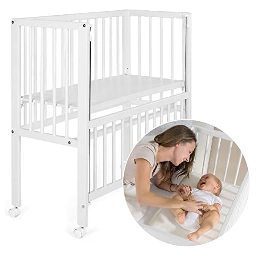 Fillikid - Minicuna de colecho Vario 2 en 1 / Cuna adosada abatible - también para camas con canapé, regulable en altura, con ruedas / 90x40 cm / Madera maciza de haya blanca