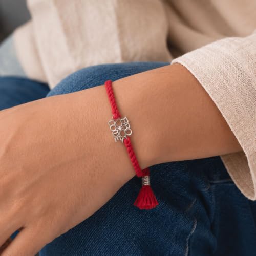 Image of MAIRA 925 Sterling Silver Premium Designer Bracelet Rakhi for Brother | Handmade Raksha Bandhan Sacred Thread with Silver-Tone Geometric Charm & Adjustable Red Braided Cord | Traditional Festival Rakhi Gift (FLOWER)