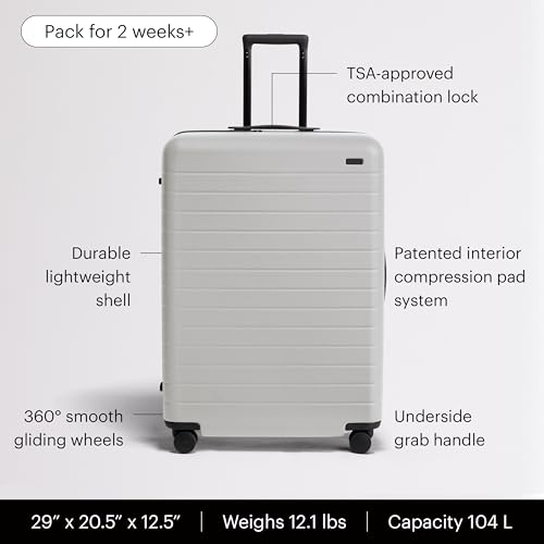 Image of Away Large Checked Luggage - 29-Inch Lightweight Hardside Suitcase with Four WhisperGlide 360 Spinner Wheels, Interior Compression System, TSA-Accepted Lock - Cloud Gray