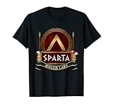 En el diseño se muestra el icónico Spartan Lambda en un escudo Aspis de Hoplite, utilizado por los lacedemonios algún tiempo después, junto con los cascos corintios y las lanzas de Dory. parte de la antigua Grecia,