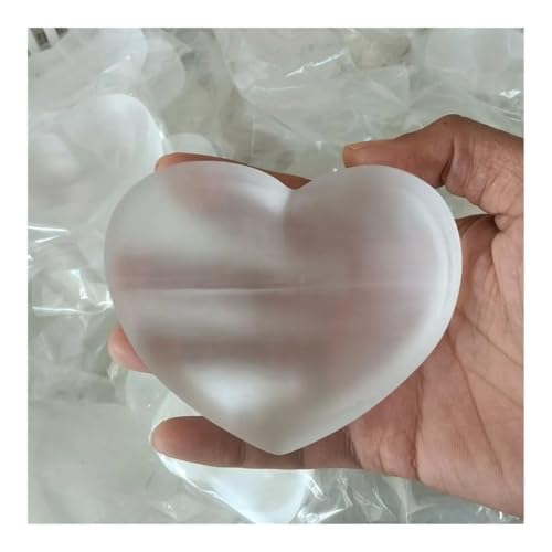 Coupelle en cœur de sélénite blanche pour créer une ambiance zen dans votre chambre