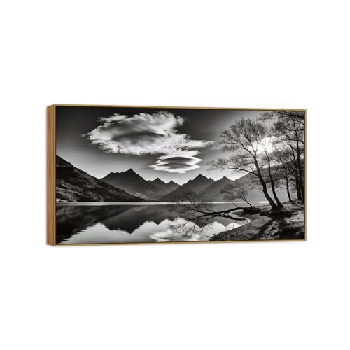 Toile paysage lac et montagne noir et blanc contre les murs vides