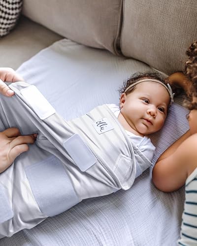 Image of The Ollie Swaddle - Adjustable Baby Swaddle for Newborns | Pediatrician-Approved for Safe Sleep | Easy Closure | Arms-Out | Lightweight, Machine-Washable | Easy Diaper Access