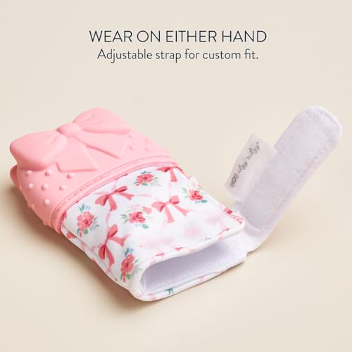 Image of Itzy Ritzy Silicone Teething Mitt - Soothing Infant Teething Mitten with Adjustable Strap, Crinkle Sound & Textured Silicone to Soothe Sore & Swollen Gums - for Ages 3 Months & Up (Bow)