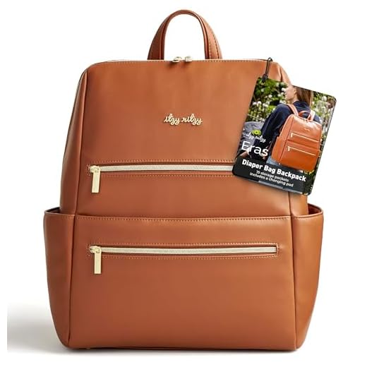 Itzy Ritzy Eras Diaper Bag Backpack – Large Capacity Baby Backpack Diaper Bag Featuring Neutral Design, 15 Pockets, Changing Pad, Stroller Straps, and Comfortable Backpack Straps, Cognac