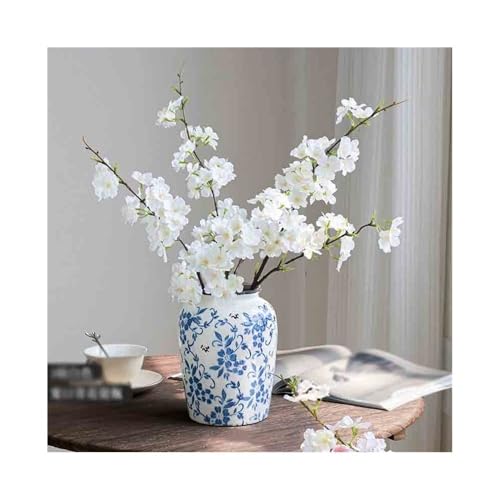 Fleurs de cerisier artificielles pour créer un coin zen dans le salon