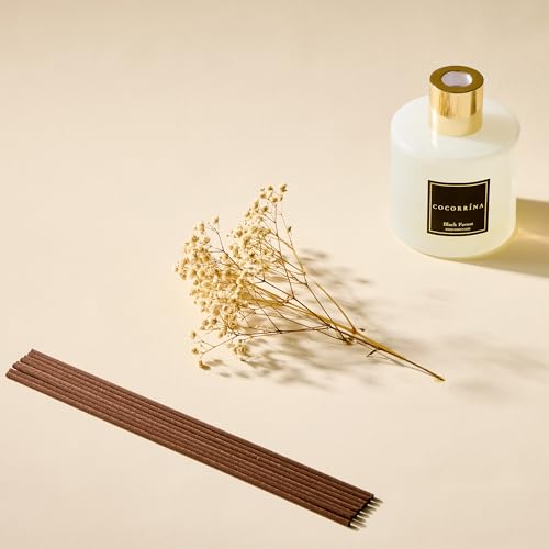 Image of COCORRINA Reed Diffuser - Black Forest 17 Fl.oz Reed Diffuser with 8 Sticks Scented Diffuser with Preserved Flowers for Bathroom Home Decor