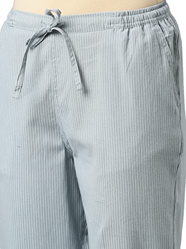 Image of GO COLORS Ikat Print Beige Printed Pencil Pant for Women | Breathable, Side Pocket