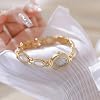 ADSBIAOYE Womens Gold Watch Waterproof Quartz Wrist Watch Elegant Oval Vintage Small Dial Bracelet Watch Fashion Dress Watches for Ladies