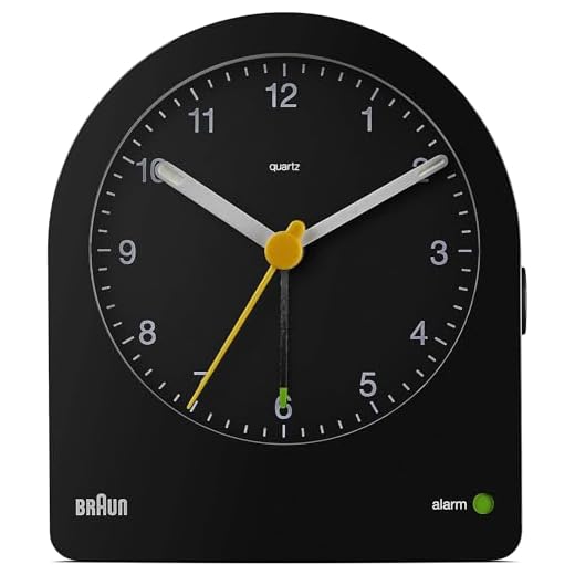 Braun Classic Analogue Alarm Clock with Snooze and Continuous Backlight, Quiet Quartz Movement, Crescendo Beep Alarm in Black, Model BC22B.