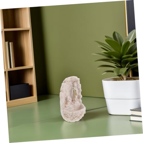 Virgen en forma de soporte para entrada que soluciona rincones vacíos 6