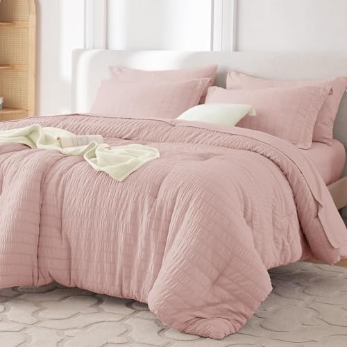 Image of MUXHOMO 7 Pieces King Comforter Set, Seersucker Bed in a Bag King Size, All Season Luxury Bedding Set with Comforter, Flat Sheet, Fitted Sheet, Pillowcases & Shams, Rose Gold