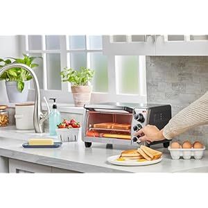 BLACK+DECKER 4-Slice Toaster Oven, Even Toast, 4 Cooking Functions Bake, Broil, Toast and Keep Warm, Removable Crumb Tray, Timer BLACKDECKER 4 Slice Toaster Oven Even Toast 4 Cooking Functions Bake Broil Toast and Keep Warm Removable Crumb Tray Timer