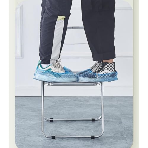 Chaise pliante en acrylique transparent et assise compacte en métal