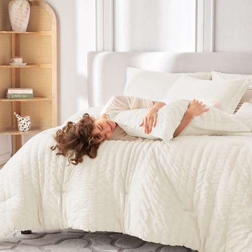 Image of MUXHOMO 7 Pieces Oversized Queen Comforter Set, Seersucker Bed in a Bag Oversized Queen Size, All Season Luxury Bedding Set with Comforter, Flat Sheet, Fitted Sheet, Pillowcases & Shams, Ivory
