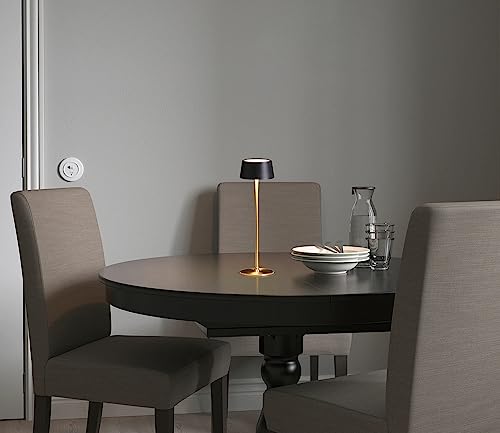 Lampe de bureau LED rechargeable or et noir chic pour intérieur soigné