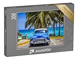 Puzzle classique de qualité dans une boîte anthracite avec l'image du puzzle comme modèle
