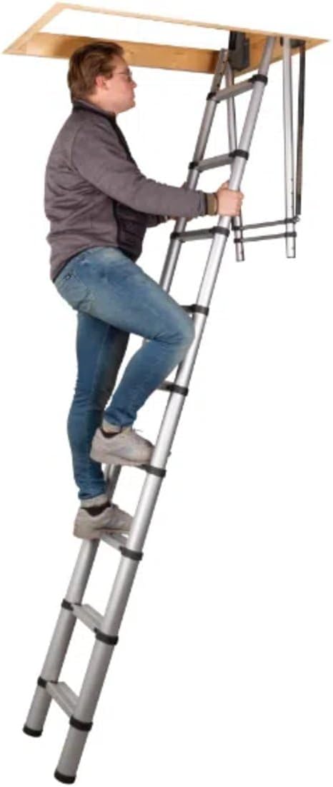 A person ascending the fully extended Batavia Telescopic Loft Ladder, which is securely installed in a loft opening.