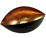 L'irrégularité de la couleur donne à la bougie chauffe-plat une structure individuelle et une vivacité