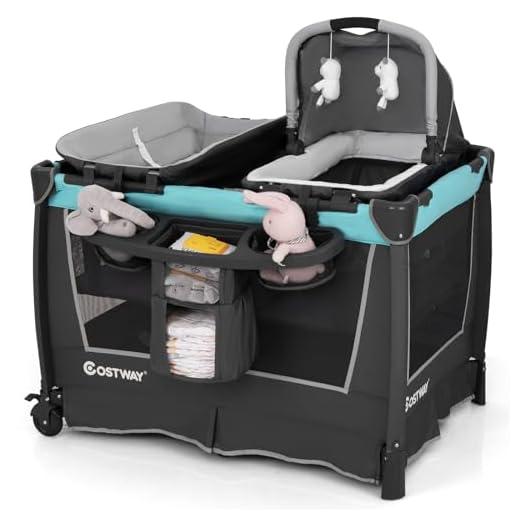 COSTWAY 4 in 1 Foldable Travel Cot, Portable Baby Bed Playard with Bassinet, Changing Table, Canopy, Music Box, Wheels, Carry Bag, Storage Rack, Nursery Center for Newborn Toddlers (Dark Gray+Floral) 29 COSTWAY 4 in 1 Foldable Travel Cot, Portable Baby Bed Playard with Bassinet, Changing Table, Cradle, Wheels and Carry Bag, Nursery Center for Boys and Girls (Mint Green)