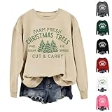 Design : présente des imprimés vibrants d'arbres de Noël, de Père Noël, de rennes, de bonshommes de neige et de flocons de neige. Comprend un col rond classique, des poignets côtelés et une poche avant spacieuse pour un style festif pratique.