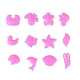 Muchos moldes de arena de diferentes formas criaturas del océano.