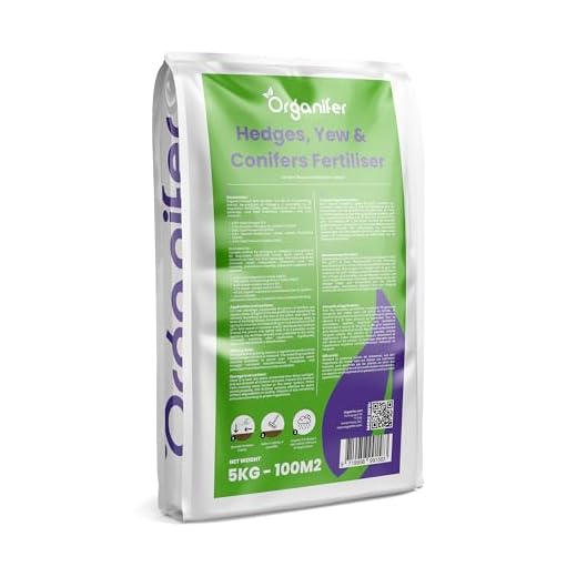 GREEN24 Spezial Kirschlorbeer Dünger FE PRO mit Eisen Prunus laurocerasus NPK, Volldünger für Lorbeer Pflanzen und Hecken, Premium Flüssigdünger 14 Dünger Für Hecken, Eiben Und Koniferen - All-In-One - 5 Kg Pro 100 M2 - Pellets Für Dichten, Grünen Wuchs, Starke Wurzeln Und Widerstandsfähigkeit - Für Gesunde Hecken - Organifer