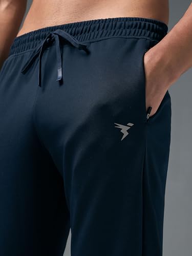 Image of TECHNOSPORT Men's Slim Fit Track Pants with Zip Pockets, ELASTO Plus Quick Dry Stretchable Lightweight Lower for Gym Running Yoga and Sports