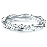 MEMOIRE-RING: Der funkelnde Pavé-Kranz entlang der in Wickelring-Optik gestalteten Ringschiene (3 mm) macht den Ring zum Blickfang