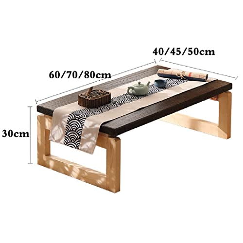 Table basse pliable bois marron pour optimiser un studio