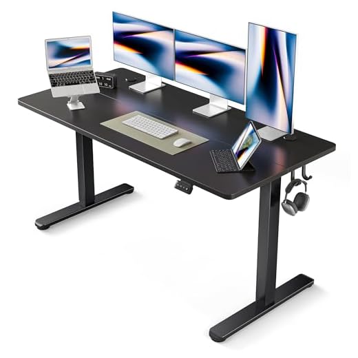 FEZIBO Electric Standing Desk, 63 x 24 Inches Height Adjustable Table, Ergonomic Home Office Furniture with Splice Board, Black Frame /Black Top