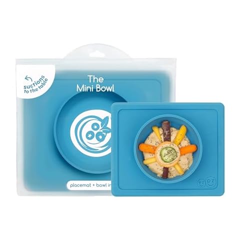 ezpz Mini Bowl for 12 Months+ (Blue) - 100% Silicone Suction Bowl with Built-in Placemat for Toddlers - Comes with a Reusable Travel Bag Cover