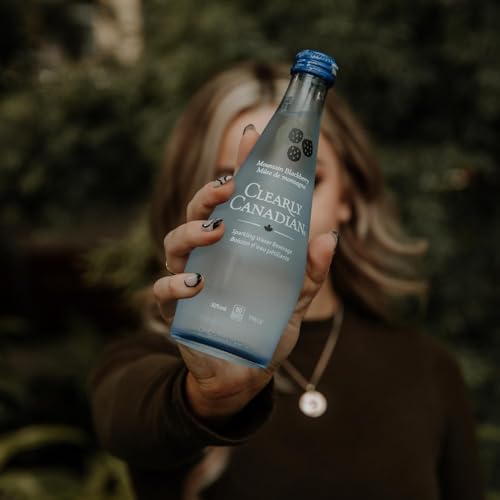 Image of Clearly Canadian Sparkling Flavored Water, 11 oz Glass Bottles - Variety of Refreshing Flavors, Premium Carbonated Beverage, Available in 12-Pack and 24-Pack Options (12 Pack, Peach /Blackberry)