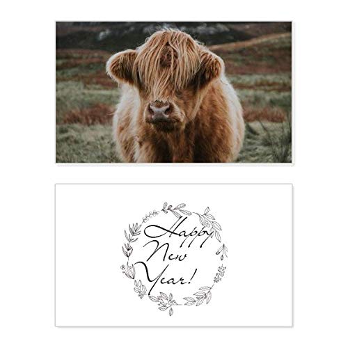 Tarjeta con mensaje de bendición de Año Nuevo y motivos de búfalo salvaje