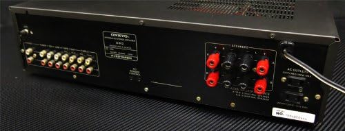 דערציען view of the ONKYO A-912 Integrated Ampרעדנער, ווײַזנדיק פֿאַרשידענע אַודיאָ אַרײַנגאַנג/אַרויסגאַנג דזשעקס און רעדנער טערמינאַלס.