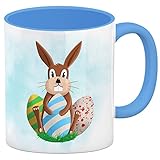 Osterhase und Ostereier Kaffeebecher Hellblau EIN niedliches Geschenk für Kinder zu Ostern oder als witzige Teetasse mit süßem Osterhasen Kaffeebecher Hellblau Hellblau Diese Tasse