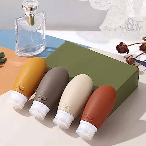 Leak Proof Silicone Travel Bottles,4 Pack 3.4oz Liquid Squeezable Refillable Portable Accessories/Cosmetic Containers,BPA Free,Travel Size Bottles for Toiletries Shampoo Conditioner Lotion(Brown)