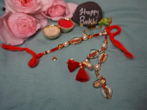UtsaWe Rakhi Gift Box with Bhaiya Bhabhi Rakhi Set made of Cowrie Shells, Pearls, Red Tassels, Includes Roli, Chawal, Raksha Bandhan Card, Thali Set, Chocolates (Red Lumba Rakhi)2
