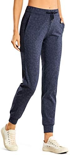 CRZ YOGA 4-Way Stretch Golf Joggers for Women, 27" Casual Travel Workout Pants, Lounge Athletic Sweatpants with Pockets Smog Blue Leopard Print Medium