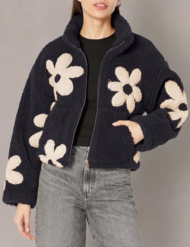 BLANKNYC floral sherpa jacket styled for casual outdoor wear.