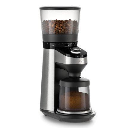 OXO On Conical Burr Coffee Grinder with beans in hopper and ground coffee in bin