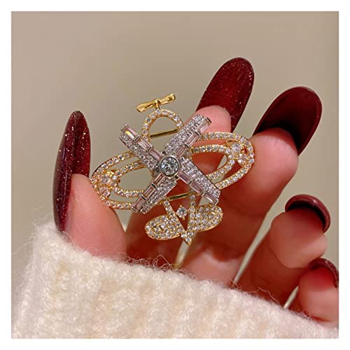 Broche femme plein diamant pour masquer un pli et sublimer une tenue terne