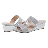 The Bandolino Iluvit low wedge heeled sandals feature a crystal-encrusted double strap. Perfect for day to night attire and the comfort footbed gives you unmatched comfort. Open/Almond Slip on Closure Imported 2.17" Heel Height