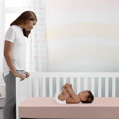 Image of Delta Children Twinkle Stars Crib and Toddler Mattress with Breathable, Removable Machine-Washable Cover - GREENGUARD Gold - Waterproof Baby Bed - Sustainably Sourced Fiber Core - 52 inchLx27.5 inchW, Pink