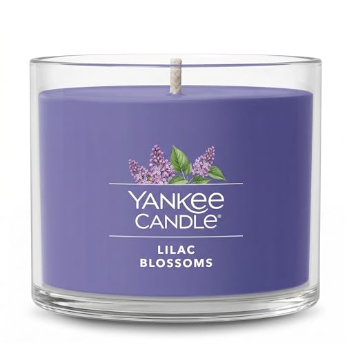 Image of Yankee Candle Mini Jar Scented, Lilac Blossoms, Premium Floral Home Fragrance Wax Blend Long Lasting Aroma for Daily Relaxation, 1.3 Ounce (Pack of 4)