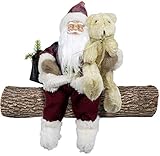Kantenhocker Weihnachtsmann mit vielen Details, Größe circa 30 Zentimeter (der Baumstamm unter dem Santa dient lediglich zur Verdeutlichung der sitzenden Position, er ist in der Lieferung nicht enthalten)
