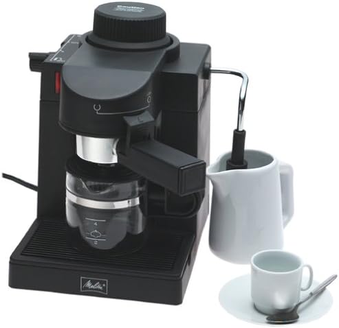 Melitta MEXKITB Espresso Maker with frothing pitcher and a single espresso cup.