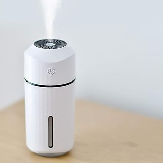 Humidificateur de voiture, chargement sans fil, humidificateur d'air de voiture, petite machine d'aromathérapie, parfum, humidificateur de purification portable mini, petit et mignon, blanc noble