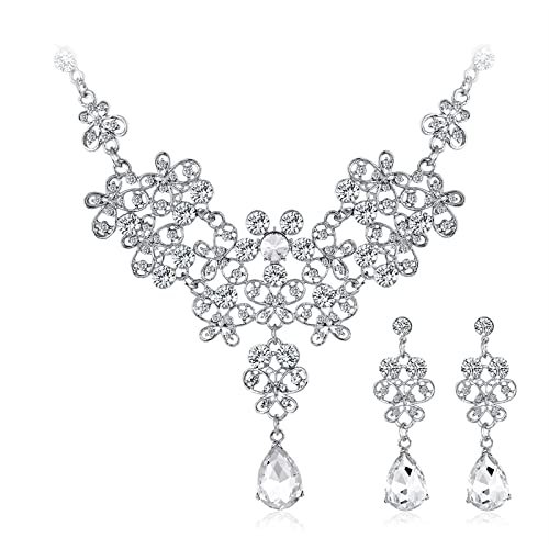 Juego de joyas de flores plateadas para lucir en cenas especiales y eventos de noche